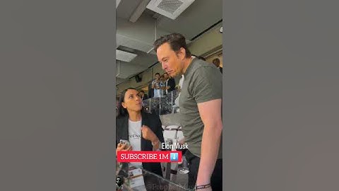 Elon Musk Protected by his Humanoid Robot Bodyguard Eyes