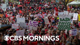 30,000 Los Angeles school workers go on strike over support workers’ pay