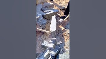 Manual Stone Splitting with Sledgehammers in a Traditional Quarry Setting