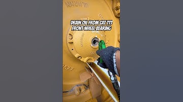 How Much Oil in a Giant Truck Bearing? Drain Oil from CAT 777 Front Wheel Bearing #mechanic