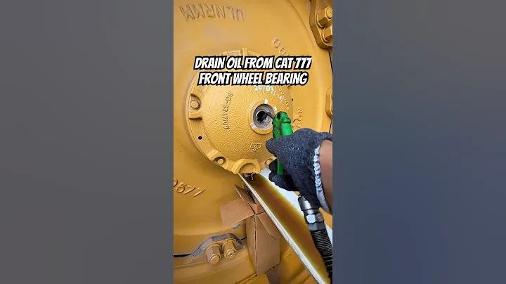 How Much Oil in a Giant Truck Bearing? Drain Oil from CAT 777 Front Wheel Bearing #mechanic