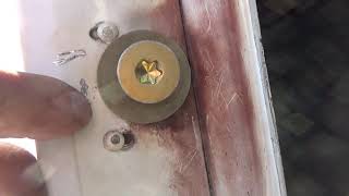 Replace door latch striker on a '97 Freightliner FLD