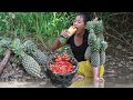 Pineapple with Hot salt chili for food and Eating delicious in the jungle