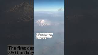 Thick smoke clouds from Washington wildfires rise above mountains