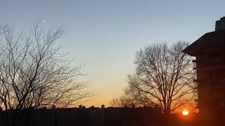 Sunset, snow-trees-chimneys, orange-blue sky winter Chicago weather Northbrook IL February 24 2021 screenshot 5