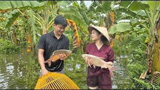 During Heavy Rain and Flooding a Businessman and Young Woman Catch an Unexpected Haul of Fish