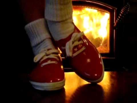 Roxy's red rubber Keds Winterettes Squeaky Shoe Play