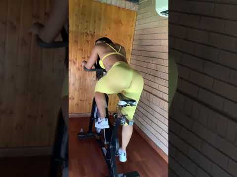 Sara Vixen On Her Bike In Yellow Leggings