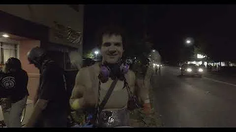 Protester talking to riot police about negotiations