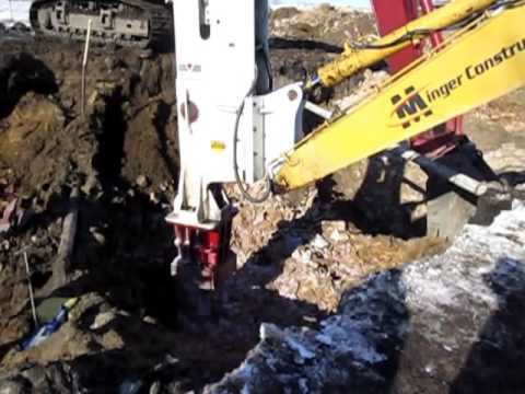Surestrike 6000 Rock Breaker Mounted on a Komatsu PC600 Hydraulic Excavator