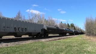 A trio of AC GEVOs lead CN Train 594 West at Mile 40