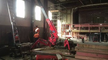 Seismic strengthening of a historic building using shotcrete.