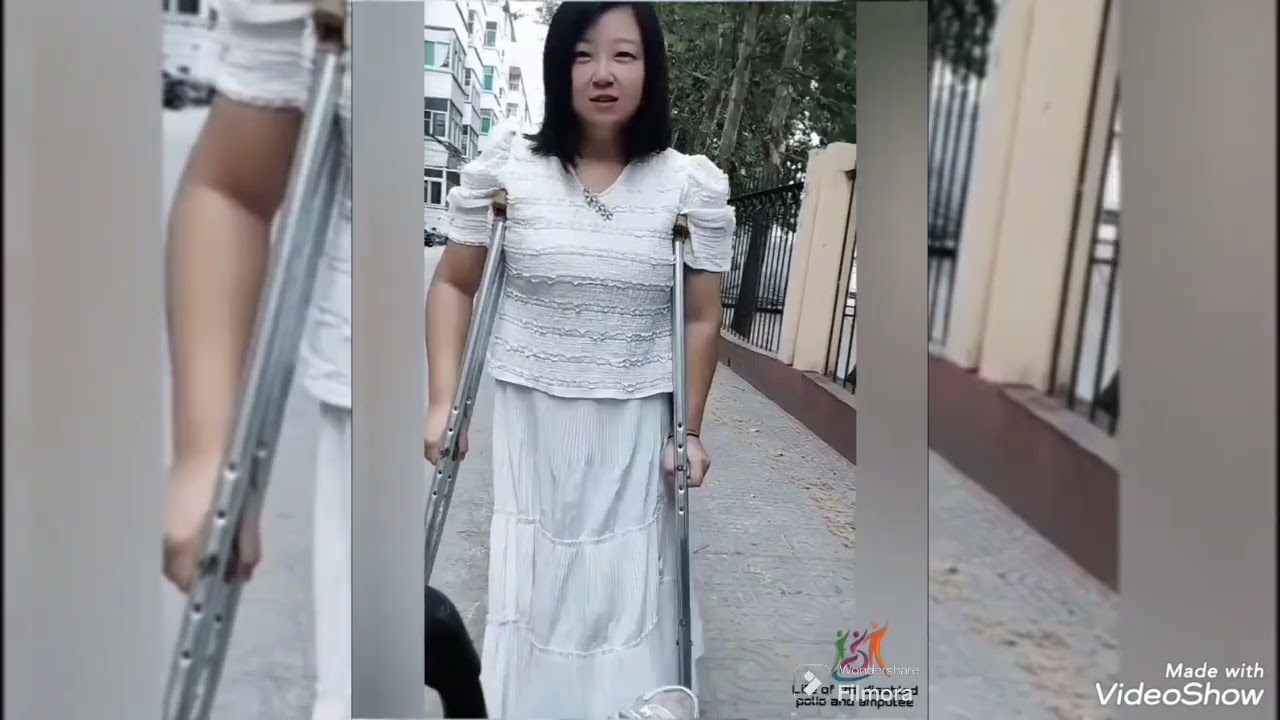 Beautiful woman with polio walks on crutches #polio 