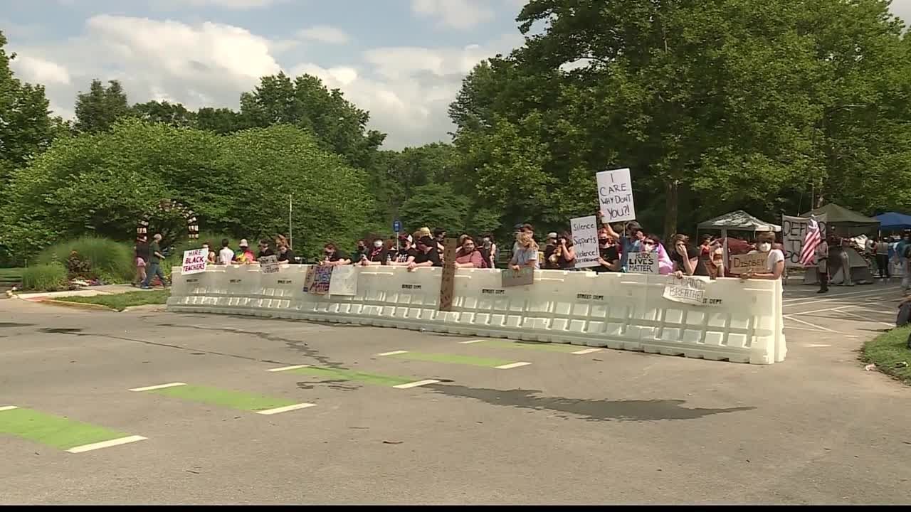 Protesters shutdown part of Massachusetts Street in Lawrence
