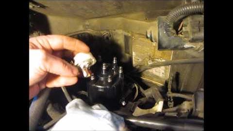 Rotor button stuck on the distributor. One way to remove.