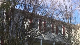 Bullet shot through wall kills person in home next door in Danbury