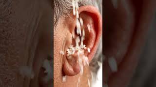 Rice grains flowing over Ear ASMR  #asmrtingles #asmr #satisfying #relaxing #shorts #asmrmatter