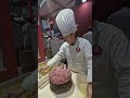 Filling Chinese Dumplings. Italy Food Fair
