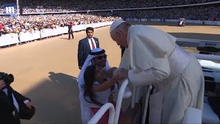 Girl breaks security barriers to run to the Pope in UAE screenshot 3