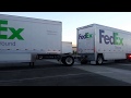 Hooking up to a second trailer with dolly on the lead trailer Fedex Ground Driver