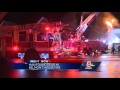 Flames rip through multi-family home