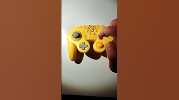 pressing the up dpad button on a yellow pikachu gamecube switch controller