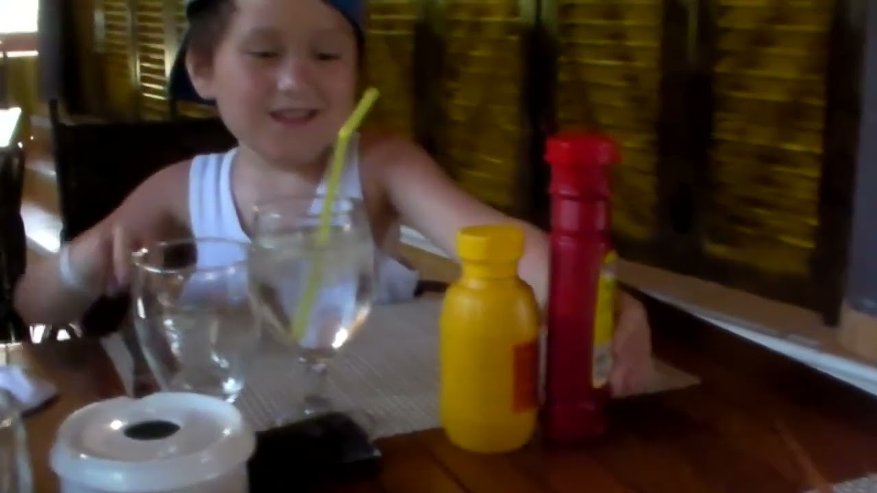 5 year old using condiments and utensils as a toy | July 14, 2011