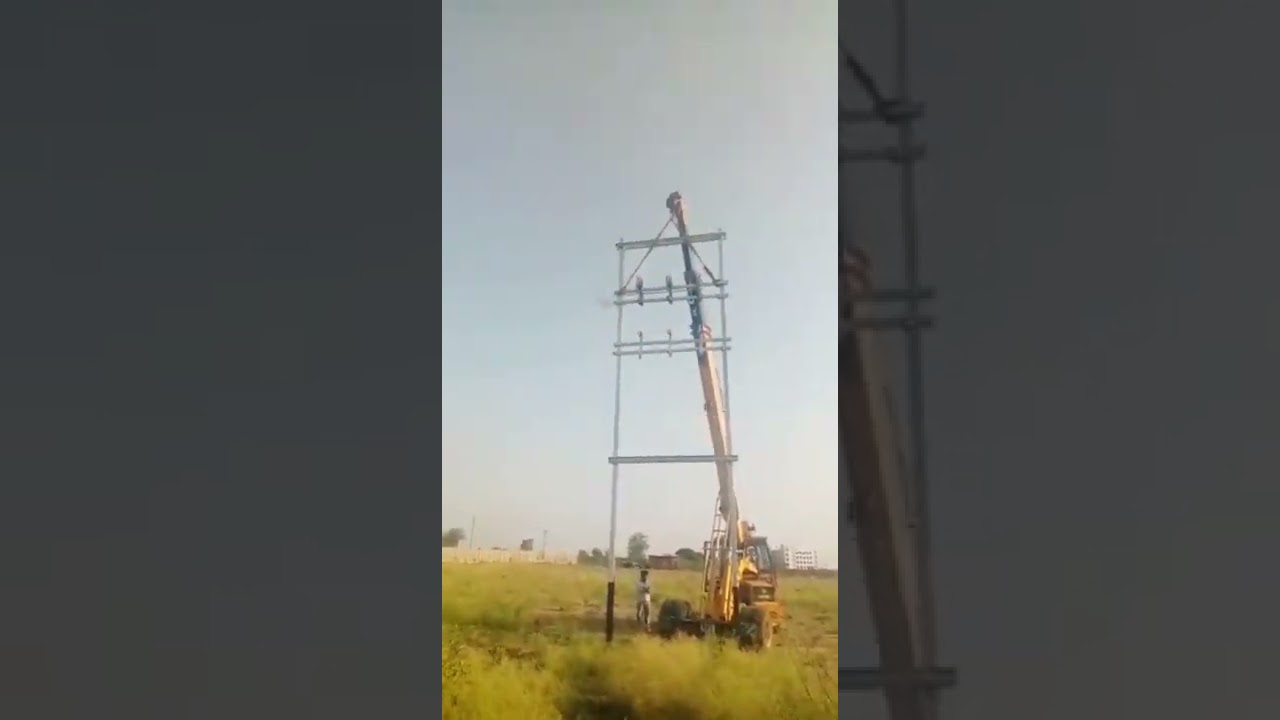 Erection of electric double pole structure.