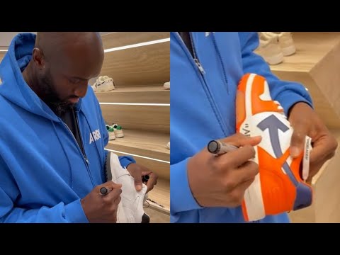 Virgil Abloh Works Shift At OFF-WHITE Paris Store, Signs Shoes