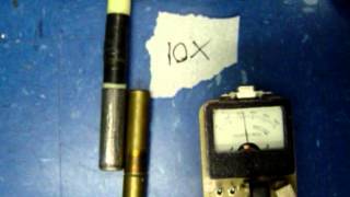 Californium neutron source and Nancy Wood enriched BF3 proportional counter tube.
