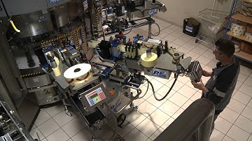 P.E. LABELLERS FULL HD VIDEO CHAMPAGNE LABELLING MACHINE