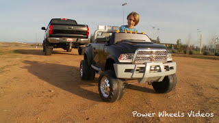 The 2014 toyota tundra 4x4 vs kid trax dodge ram in this tug-of-war
battle! truck daddy truck!