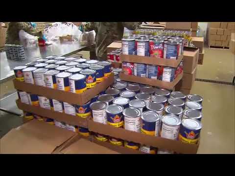 corona-virus-||-national-guard-packing-up-food-for-distribution-in-new-rochelle,-new-york