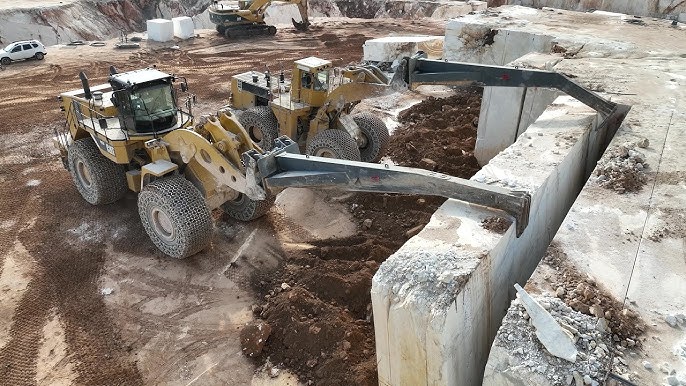 Huge Wheel Loaders Working In the Biggest Marble Quarry In Europe - Birros Marbles - YouTube