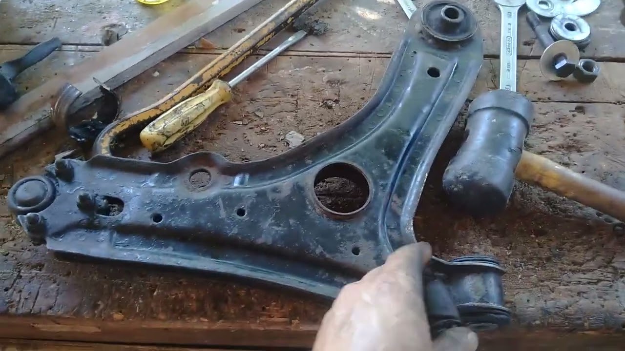 trocando bucha da bandeja dianteira do Golf mk3