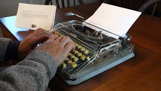 See-through Royal Mercury typewriter at work