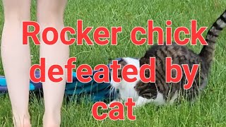 Little pigtailed rocker chick defeated by cat