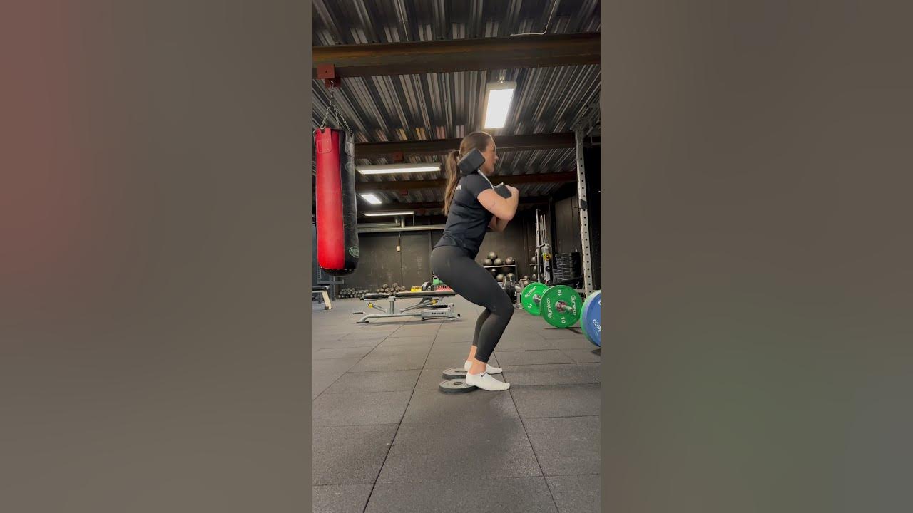 Elevated heel squat with dumbbells YouTube