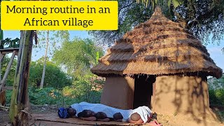 Morning routine in remote countryside in Northern Uganda. Cooking breakfast