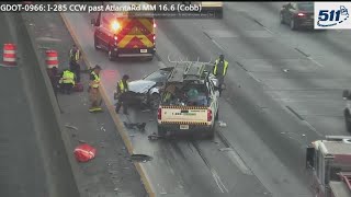 Two-vehicle collision causing slowdowns on I-285 northbound in Cobb Co.
