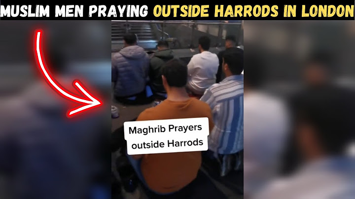 A GROUP OF MUSLIM MEN PRAYING MAGHRIB SALAH NEAR HARRODS IN LONDON !