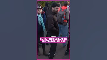 De pleuris breekt uit tijdens een koranverbranding waar ook tegendemonstranten aanwezig zijn.