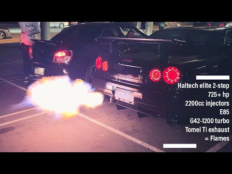 Big flames R34 GTR G42 turbo 2-stepping at a car meet!