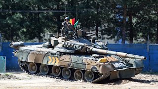 US Army soldiers ride on South Korean T-80U tanks and BMP-3 IFVs