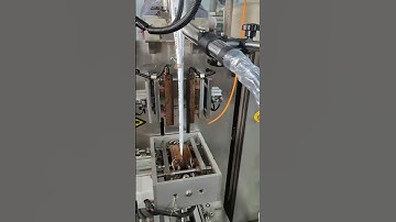 Leadjet V680 inkjet printer works with vertical packaging machine. code date on the food package.