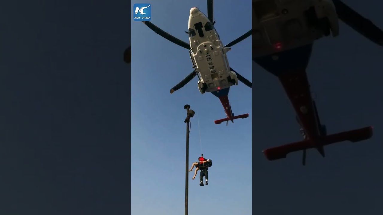 Chinese Fisherman Rescued By Helicopter After Falling Ill At Sea