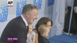 alec baldwin struts boss baby blue carpet with wife and children
