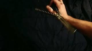 Balisong tricks. Choker fan closing.