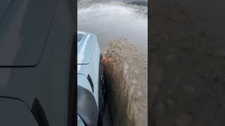 Bronco Sport through a mud puddle