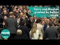 Prince Harry and Meghan Markle greeted by hundreds of Belfast locals